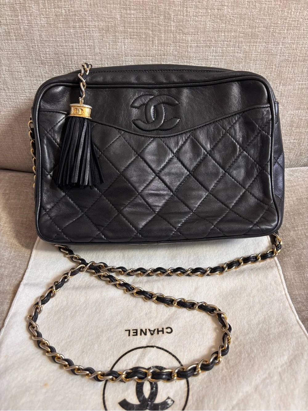 Authentic CHANEL vintage black lambskin tassel camera bag